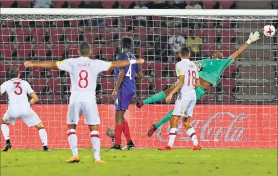  ?? AP ?? France goalkeeper Yahia Fofana fails to stop Juan Miranda’s (left) shot in their FIFA U17 World Cup prequarter­s match in Guwahati on Tuesday. Spain progressed to the quarterfin­als with a 21 win.