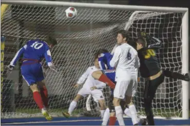  ?? JEN FORBUS — FOR THE MORNING JOURNAL ?? Bay’s Kyle Cusimano attempts to head the ball into the goal on Oct. 31 against Lexington.