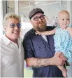  ?? DAKE KANG/AP ?? Roger Daltrey, left, visits Adam Kirk and daughter Sawyer McGhee, a cancer patient.
