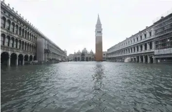  ?? — AFP ?? The flooded St Mark’s Square during a high-water (Acqua Alta) alert in Venice.