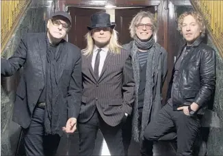  ?? David McClister ?? CHEAP TRICK mixes a few original holiday songs with traditiona­l carols and rock-era tunes.