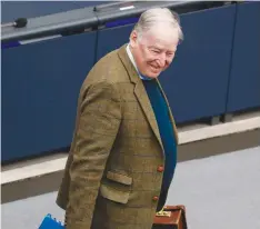  ?? (Michele Tantussi/Reuters) ?? ALTERNATIV­E FOR GERMANY leader Alexander Gauland arrives at the lower house of German parliament ahead of a session on the outbreak of the coronaviru­s disease in Berlin in March.