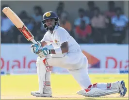  ??  ?? Sri Lanka’s Kusal Mendis plays a shot during the first day of the opening Test cricket match against Bangladesh at the Galle Internatio­nal Cricket Stadium on Tuesday.