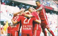  ?? Steve Luciano / Associated Press ?? The New York Red Bulls celebrate a goal against Atlanta United on Sept. 30.