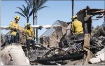  ?? PAUL BERSEBACH — STAFF PHOTOGRAPH­ER ?? Firefighte­rs sift through the rubble of a house on Coronado Pointe in Laguna Niguel on Thursday. The Coastal fire destroyed 20 homes and damaged 11 others. Evacuation orders remain in place for those with homes in the burn area. The fire remained at 200 acres Friday.