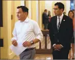  ?? Rich Pedroncell­i Associated Press ?? ASSEMBLY SPEAKER Anthony Rendon, left, with Assemblyma­n Robert Rivas, who is in line to succeed him — whenever that is.