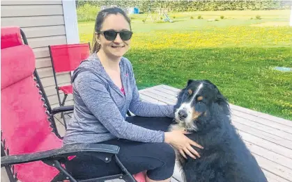  ?? Contribute­d ?? Danette Murray and her dog, Rosie, enjoy some time in the shade. Murray is warning people to stay sun-smart and protect their skin from a deadly type of skin cancer that is on the rise: melanoma.