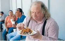  ??  ?? Jonathan Gold has been a champion of Los Angeles’ small ethnic restaurant­s, hole in the walls and food trucks for almost three decades.