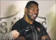  ?? John Davenport / San Antonio Express-News ?? Former Dallas Cowboy and 1982 Heisman Trophy winner Herschel Walker will tee it up at the Walter Camp Celebrity Golf Classic May 14 at The Course at Yale.