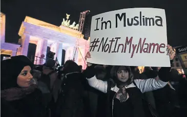  ?? AFP/dpa ?? Muslims gathered at a community tolerance rally in front of Brandenbur­g Gate in Berlin to condemn the jihadist attacks in Paris. Hard-line Islam has many sources and more support than we want to believe.