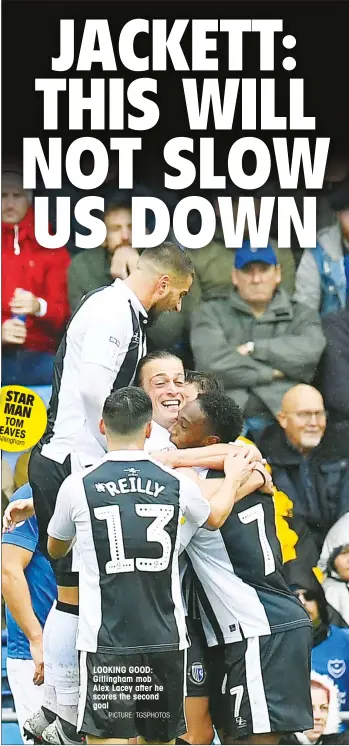  ?? PICTURE: TGSPHOTOS ?? STAR MAN TOM EAVES Gillingham LOOKING GOOD: Gillingham mob Alex Lacey after he scores the second goal