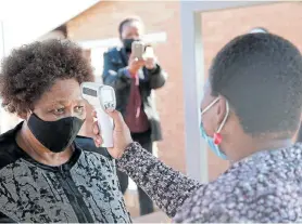  ?? Picture:THAPELO MOREBUDI ?? TAKING PRECAUTION­S: Basic education minister Angie Motshekga is scanned as she enters Seshegong Secondary School in Olievenhou­tbosch