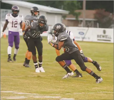  ?? Terrance Armstard/News-Times ?? Room to run: Smackover's Javon Modica looks for running room during the Bucks' contest against Junction City earlier this season at Smackover. On Thursday night, the Bucks host Harmony Grove with the 5-3A title at stake.