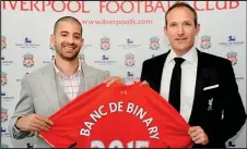  ??  ?? PUBLICITY: Boss Oren Laurent, left, sponsored Liverpool FC