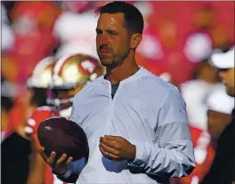  ??  ?? San Francisco 49ers head coach Kyle Shanahan walks on the field before the start of their 2019 preseason game against the Cowboys at Levi’s Stadium in Santa Clara.