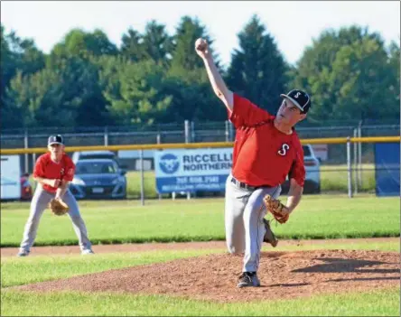  ?? JOHN BREWER - ONEIDA DAILY DISPATCH ?? Sherrill Post 230starter Blake VanDreason deals toward the plate during a 5-0Sherrill Post 230shutout over Helmuth-Ingalls.