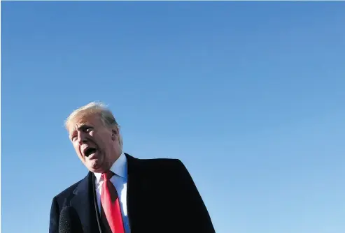  ?? NICHOLAS KAMM / AFP ?? U.S. President Donald Trump speaks to reporters Thursday before boarding Air Force One as he departs from Joint Base Andrews, Maryland, for a three-day trip to hold campaign rallies in Montana, Arizona and Nevada.