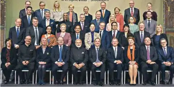  ?? PIC/PTI ?? Prime Minister Narendra Modi and the Prime Minister of Sweden Stefan Lofven with the top business leaders at the roundtable meeting at City Hall in Stockholm, Sweden on Tuesday