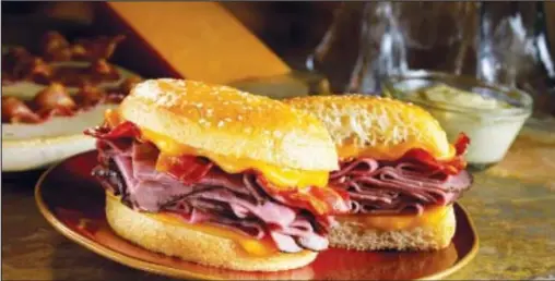  ?? SPECIAL TO NWA MEDIA ?? Incredile Smokey Beef and Bacon Sandwich can be found on the menu everyday at every Schlotzsky’s location.