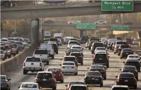  ?? Photograph: Damian Dovarganes/AP ?? Traffic on the Hollywood Freeway in Los Angeles in December 2018.