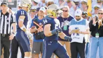  ?? PAUL W. GILLESPIE/CAPITAL GAZETTE ?? Navy inside linebacker Diego Fagot, shown celebratin­g a sack of Air Force quarterbac­k Donald Hammond III in 2019, acknowledg­ed that he wants to hold the title of defensive captain and said it would be a tremendous honor and responsibi­lity.