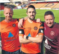  ??  ?? Dave Bowman and Hearts legend John Robertson with fan Wayne O’Hare, who won a silent auction to play in the second half tonight at Tannadice.