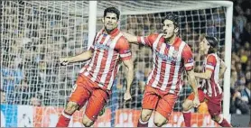  ?? FOTO: AP ?? Costa y Koke, con Filipe detrás, celebrando un gol del primero