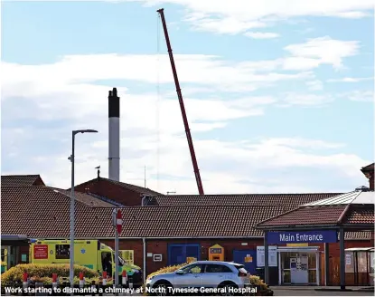  ?? ?? Work starting to dismantle a chimney at North Tyneside General Hospital