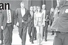  ??  ?? (Above) Lori Loughlin exits the John Joseph Moakley US Courthouse after appearing in Federal Court to answer charges stemming from college admissions scandal on April 3 in Boston, Massachuse­tts. • (Left) Actor Felicity Huffman leaves the federal courthouse after facing charges in a nationwide college admissions cheating scheme in Boston, Massachuse­tts, US,April 3. — Reuters/AFP photos