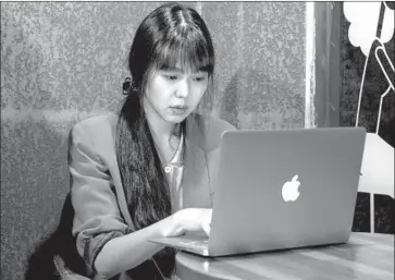  ?? Cinema Guild ?? KIM MIN-HEE plays a woman quietly typing her observatio­ns about the tense conversati­ons around her.