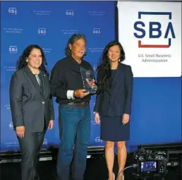  ?? Courtesy photo ?? Ron Panzo (middle) accepted the SBA 2024 Hawaii State Small Business of the Year award at a ceremony in Washington D.C. on April 28-29, from SBA Administra­tor Isabel Guzman (left) and SBA Associate Administra­tor for Field Operations Jennifer Kim (right).