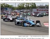  ?? MIKE CARLSON — THE ASSOCIATED PRESS FILE ?? Pole sitter Team Penske driver Josef Newgarden (2) of the United States leads the pack into turn 2 after the start of the IndyCar Firestone Grand Prix of St. Petersburg race Sunday March 10, in St. Petersburg, Fla.