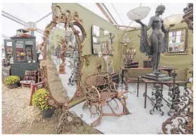  ?? Elizabeth Conley / Houston Chronicle ?? Dealers from across the country put thought and creativity into their booths at Marburger Farm Antique Show in Round Top. It’s a great place to get ideas.