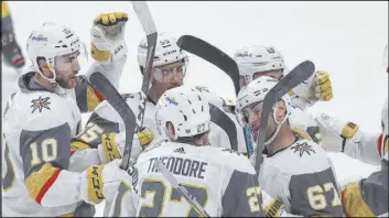  ?? Josie Lepe The Associated Press ?? Max Pacioretty (67) celebrates his winning goal against San Jose on Friday. The Knights had to leave their hotel pregame because it filed for bankruptcy and shut down.