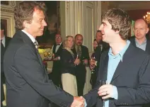  ?? Picture: PA ?? Cool Britannia: Tony Blair meets Oasis star Noel Gallagher at Downing Street in 1997