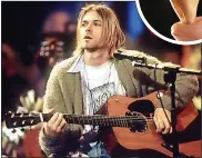  ?? ?? DESIRED: Cobain with guitar, and Lennon tooth