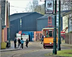  ?? ?? Traction pole bases like these at Summerlee came from the Rothesay Tramways and date from the electrific­ation of the island system in 1902. Glasgow tram 1017 drops a school party at the museum’s mine cottages. HUGH DOUGHERTY