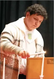  ?? Courtesy photos ?? Coahoma High School’s chapter of the National Honor Society inducted 22 new members in a recent ceremony. Clockwise from top left: NHS President Karissa Beeman speaks to the crowd during the induction ceremony; NHS Secretary Ethan Yager lights a candle as a symbolic part of the annual event; Brysen Kerby lights the candle held by new NHS inductee Isaiah Elda; members of the Coahoma High School’s NHS pose for a photo following ceremony. Congratula­tions, CHS National Honor Society members!
Special to the Herald