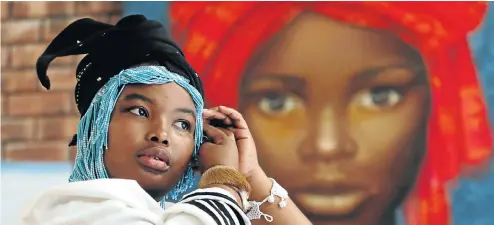  ?? Picture: Esa Alexander ?? Anita Sikhutshwa, a traditiona­l healer from Woodstock, Cape Town, left a well-paid job to follow the calling she could no longer ignore.