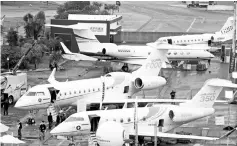  ?? — Reuters photo ?? A general view of the Latin American Business Aviation Conference &amp; Exhibition fair (LABACE) at Congonhas airport in Sao Paulo, Brazil. A dogfight over the assets of troubled Alitalia and Air Berlin heralds a new shake-up in the European airline industry - but unless other carriers cut costs they may meet a similar fate themselves, analysts warn.