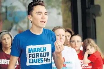  ?? AMY BETH BENNETT/SUN SENTINEL ?? Parkland survivor David Hogg speaks during a news conference at the Broward County Government Center in Fort Lauderdale on Monday, following the submission of 200 petitions to the Broward County Supervisor of Elections Office.