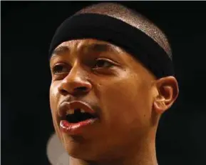  ??  ?? Isaiah Thomas had a tooth knocked off.