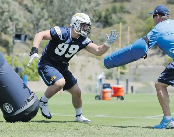  ?? — THE ASSOCIATED PRESS FILES ?? San Diego Chargers rookie defensive end Joey Bosa, seen during a rookie camp in June, ended his stalemate with the team and signed a four-year contract that includes a US$17-million signing bonus, a portion of which will be deferred.
