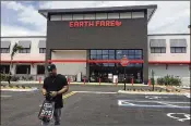  ?? SARAH PETERS / THE PALM BEACH POST ?? Earth Fare, on PGA Boulevard west of Military Trail, opens at 7 a.m. today. People who signed up online got a special preview tour Tuesday.