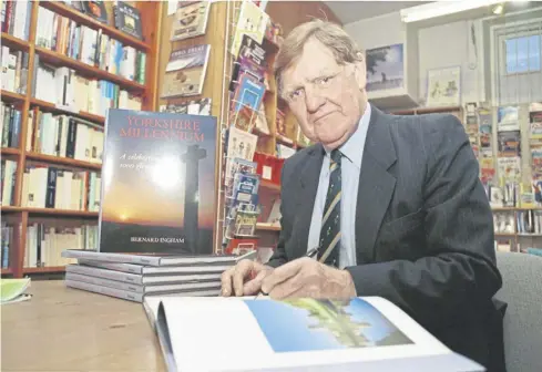  ?? ?? Sir Bernard Ingham pictured in Hebden Bridge with one of his books on Yorkshire.