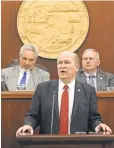 ?? MARK THIESSEN, AP ?? Alaska Gov. Bill Walker urges lawmakers to end the bickering and get down to the serious business of resolving the state’s budget crisis Wednesday in Juneau.