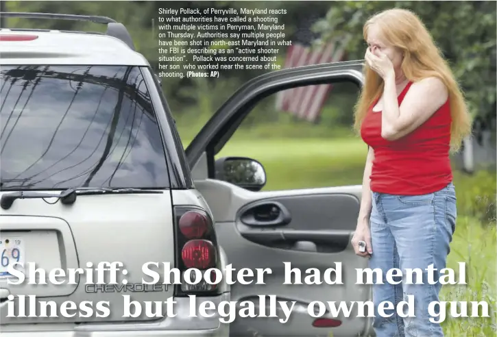  ?? (Photos: AP) ?? Shirley Pollack, of Perryville, Maryland reacts to what authoritie­s have called a shooting with multiple victims in Perryman, Maryland on Thursday. Authoritie­s say multiple people have been shot in north-east Maryland in what the FBI is describing as an “active shooter situation”. Pollack was concerned about her son who worked near the scene of the shooting.