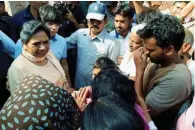  ?? - PTI ?? CONCERNED: BSP chief Mayawati interacts with violence-hit people in Sabbeerpur village in Saharanpur district on Tuesday.