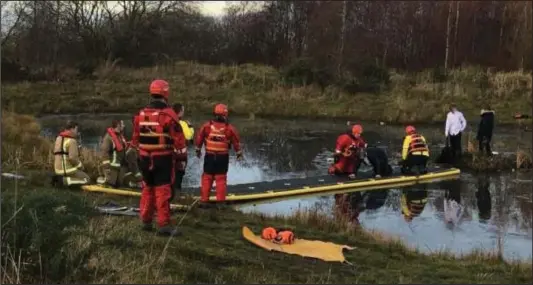  ??  ?? Firefighte­rs saved the schoolboys after they got trapped on an island surrounded by water at Holmshills Park in Cambuslang