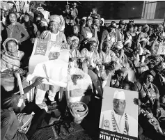  ??  ?? Supporters of Gambia’s PresidentY­ahya Jammeh of the Alliance for Patriotic Re-orientatio­n and Constructi­on (APRC) attend a campaign rally in Banjul, Gambia. — Reuters photo